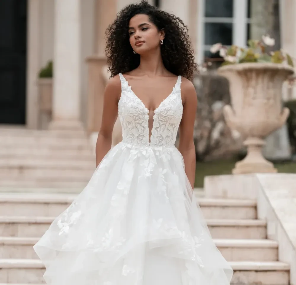 Model wearing a gown by Allure Bridals